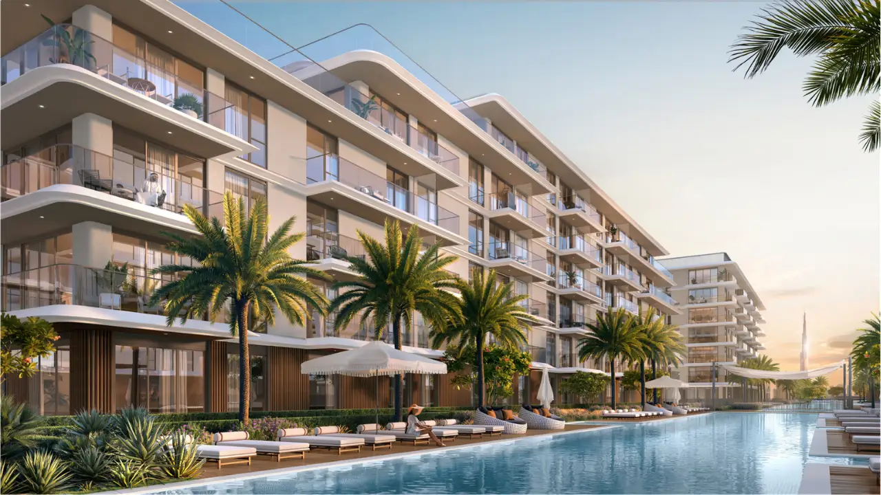 Ocean Views at Rashid Yachts & Marina by Emaar waterfront apartments with pool, palm trees, sun loungers, and modern architecture in Dubai - Presented by Tohid Fetrat