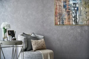 One at Palm Jumeirah Dorchester Collection by Omniyat accent chair with decorative table and artwork in Dubai - Presented by Tohid Fetrat