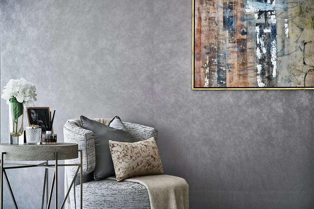 One at Palm Jumeirah Dorchester Collection by Omniyat accent chair with decorative table and artwork in Dubai - Presented by Tohid Fetrat