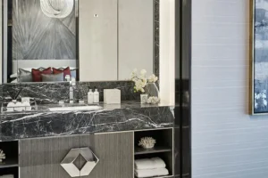 One at Palm Jumeirah Dorchester Collection by Omniyat bathroom with marble vanity and elegant finishes in Dubai - Presented by Tohid Fetrat