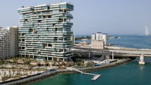 One at Palm Jumeirah Dorchester Collection by Omniyat coastal building with tiered balconies and Gulf views in Dubai - Presented by Tohid Fetrat