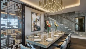 One at Palm Jumeirah Dorchester Collection by Omniyat dining area with modern interior design chandelier and staircase in Dubai - Presented by Tohid Fetrat