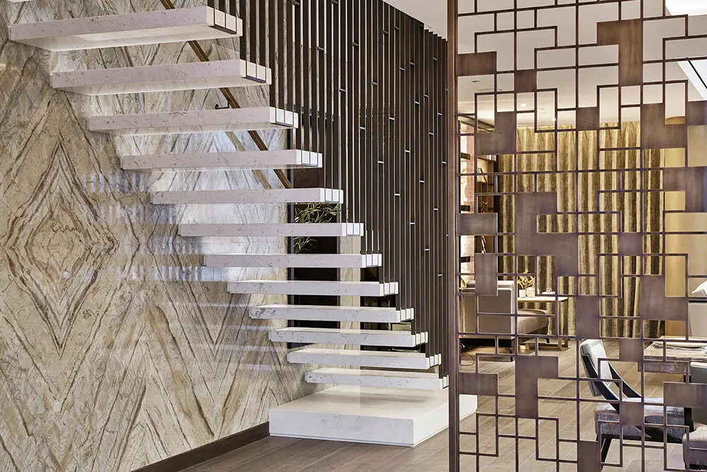 One at Palm Jumeirah Dorchester Collection by Omniyat floating staircase with marble wall and decorative partition in Dubai - Presented by Tohid Fetrat