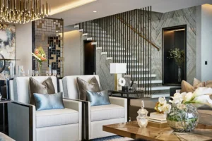 One at Palm Jumeirah Dorchester Collection by Omniyat living room with staircase modern decor and elegant seating in Dubai - Presented by Tohid Fetrat