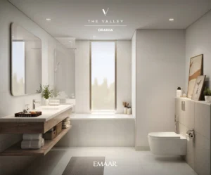 Orania at The Valley by Emaar bathroom interior with modern vanity large mirror bathtub and soft natural light in Dubai - Presented by Tohid Fetrat