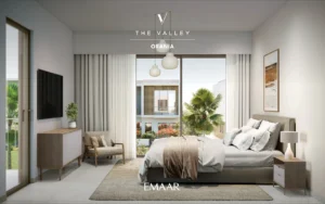 Orania at The Valley by Emaar bedroom interior with large window garden view modern furniture and natural light in Dubai - Presented by Tohid Fetrat