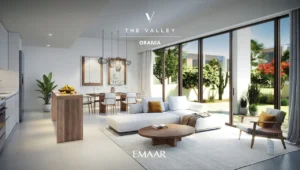 Orania at The Valley by Emaar open plan living and dining interior with modern kitchen large glass doors and garden view in Dubai - Presented by Tohid Fetrat