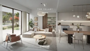 Orania at The Valley by Emaar open plan living room and kitchen interior with modern furniture large windows and garden view in Dubai - Presented by Tohid Fetrat