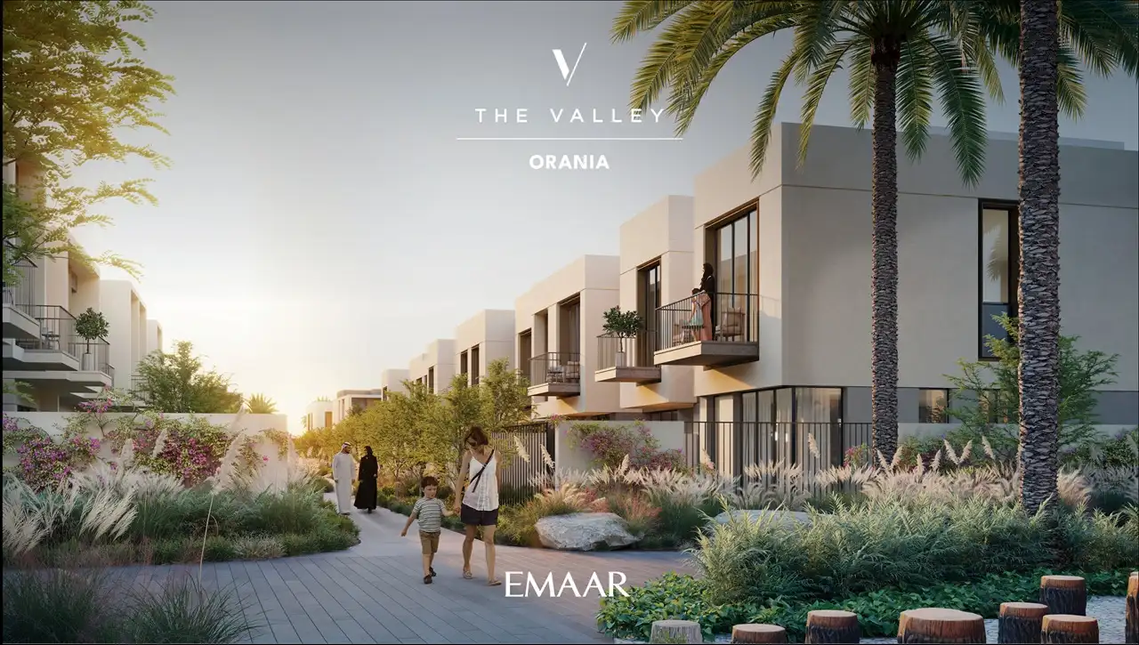 Orania at The Valley by Emaar landscaped walkway with modern townhouses and lush greenery in Dubai - Presented by Tohid Fetrat