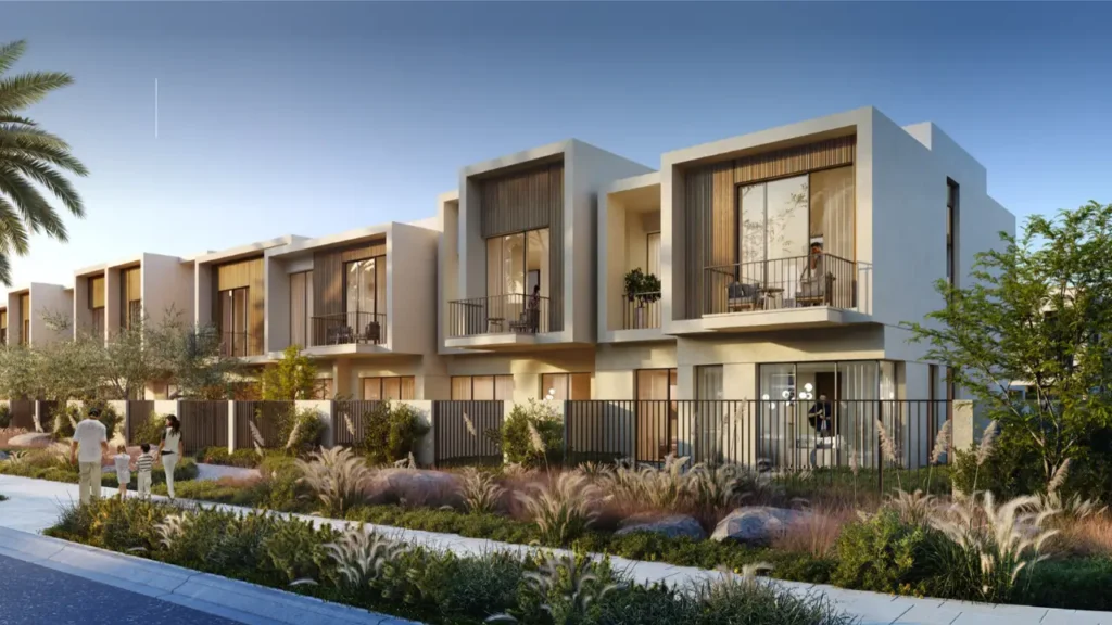 Orania at The Valley by Emaar row of modern townhouses with balconies and landscaped garden walkway in Dubai - Presented by Tohid Fetrat