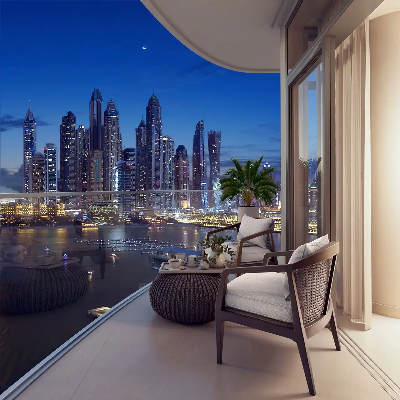 Palace Beach Residence at Emaar Beachfront by Emaar balcony seating area with marina skyline night view and waterfront in Dubai - Presented by Tohid Fetrat