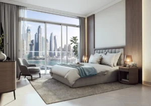 Palace Beach Residence at Emaar Beachfront by Emaar bedroom with floor to ceiling windows marina skyline view and modern furnishings in Dubai - Presented by Tohid Fetrat