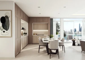 Palace Beach Residence at Emaar Beachfront by Emaar open kitchen and dining area with built in cabinetry and Gulf view in Dubai - Presented by Tohid Fetrat