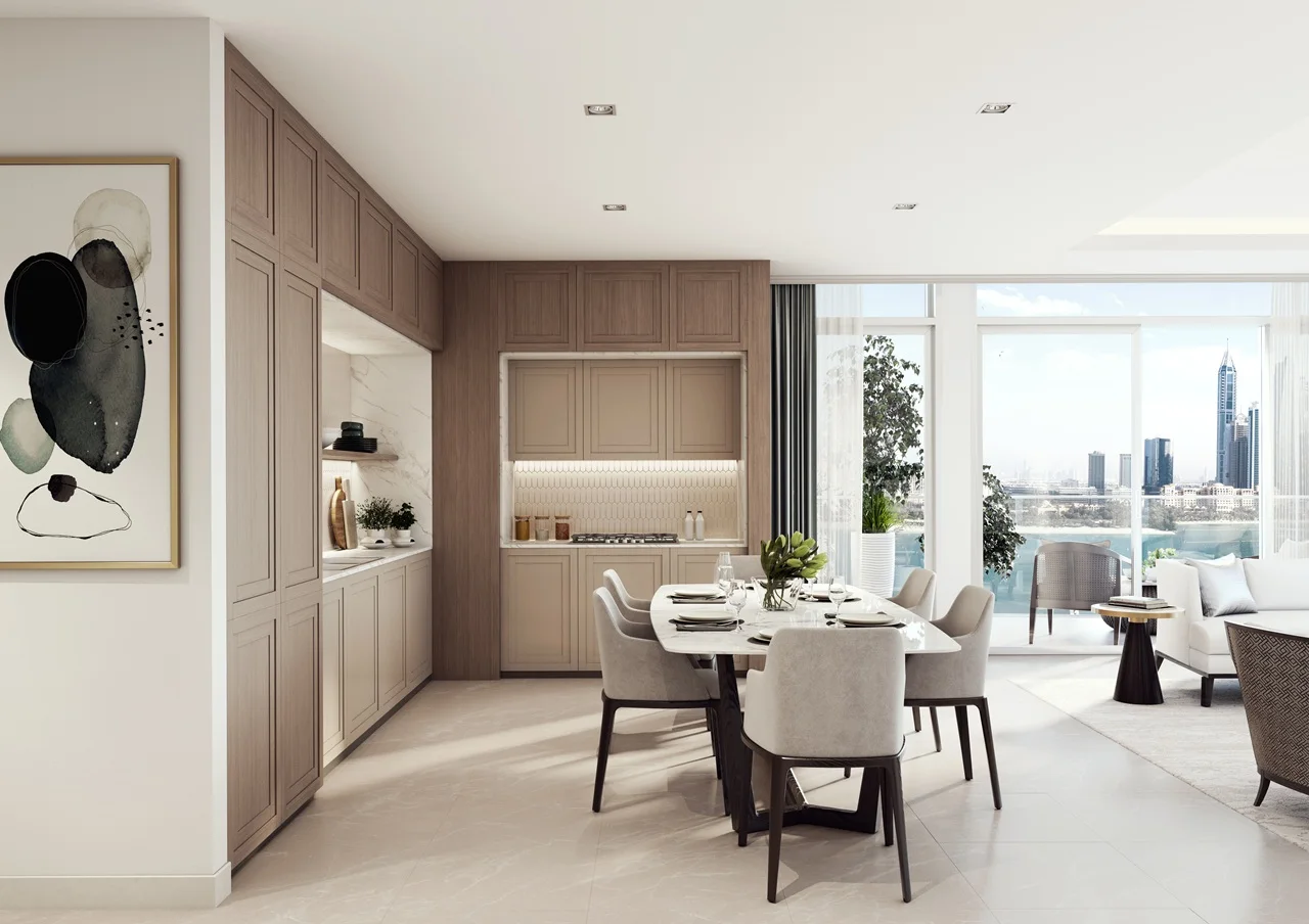 Palace Beach Residence at Emaar Beachfront by Emaar open kitchen and dining area with built in cabinetry and Gulf view in Dubai - Presented by Tohid Fetrat
