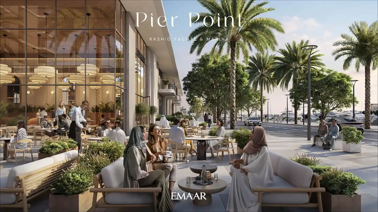Pier Point 1 at Rashid Yachts & Marina by Emaar outdoor cafe seating with palm lined promenade and marina setting in Dubai - Presented by Tohid Fetrat