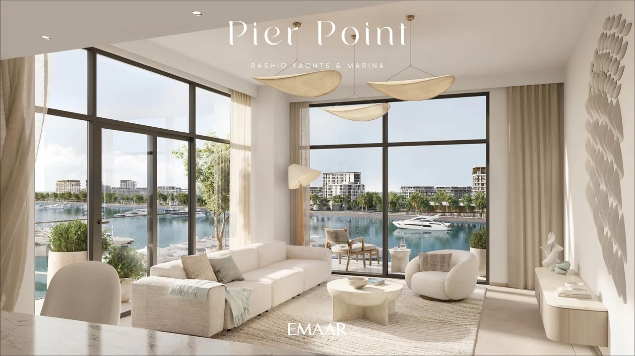 Pier Point 2 at Rashid Yachts & Marina by Emaar apartment interior living room with large windows marina view natural light and modern furnishings in Dubai - Presented by Tohid Fetrat