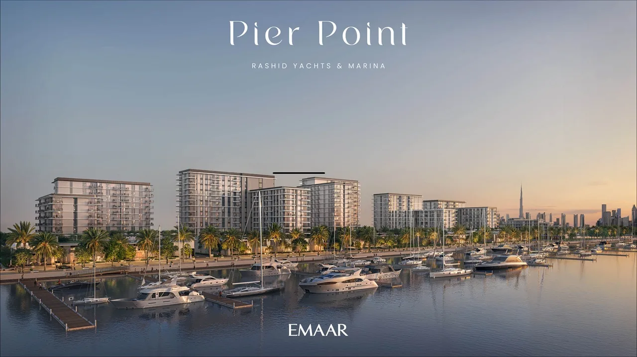Pier Point 2 at Rashid Yachts & Marina by Emaar waterfront skyline view with yachts palm lined promenade and modern residential buildings in Dubai - Presented by Tohid Fetrat
