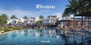 Rivana The Valley by Emaar community pool with sun loungers palm trees and modern villas in Dubai - Presented by Tohid Fetrat
