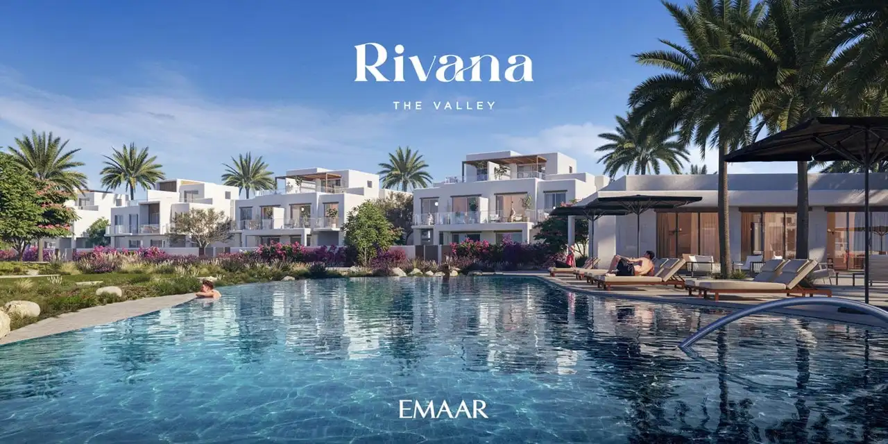 Rivana The Valley by Emaar community pool with sun loungers palm trees and modern villas in Dubai - Presented by Tohid Fetrat