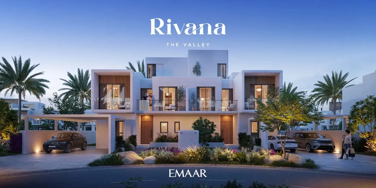 Rivana The Valley by Emaar modern villa facade with warm evening lighting private parking and landscaped frontage in Dubai - Presented by Tohid Fetrat