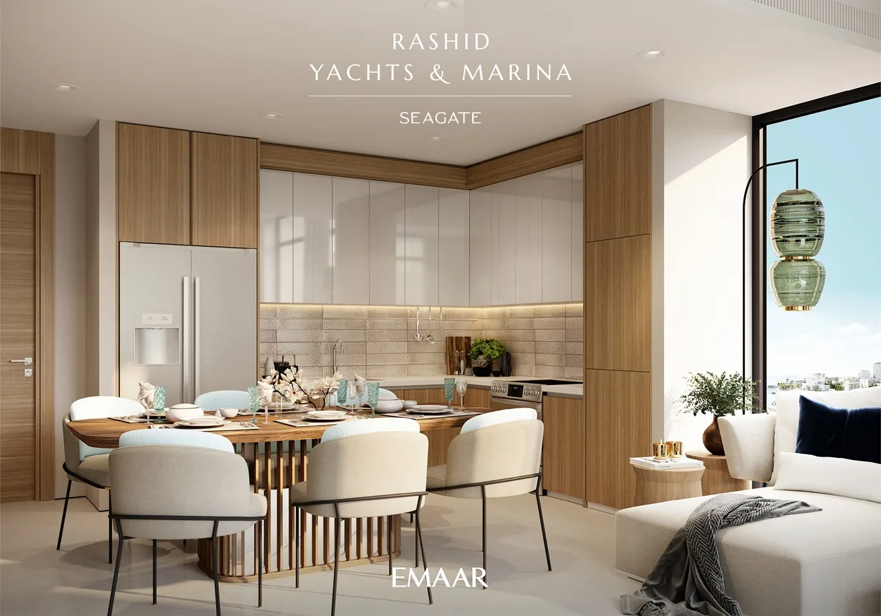 Seagate at Rashid Yachts & Marina by Emaar modern kitchen and dining interior with wood finishes open layout and natural light in Dubai - Presented by Tohid Fetrat