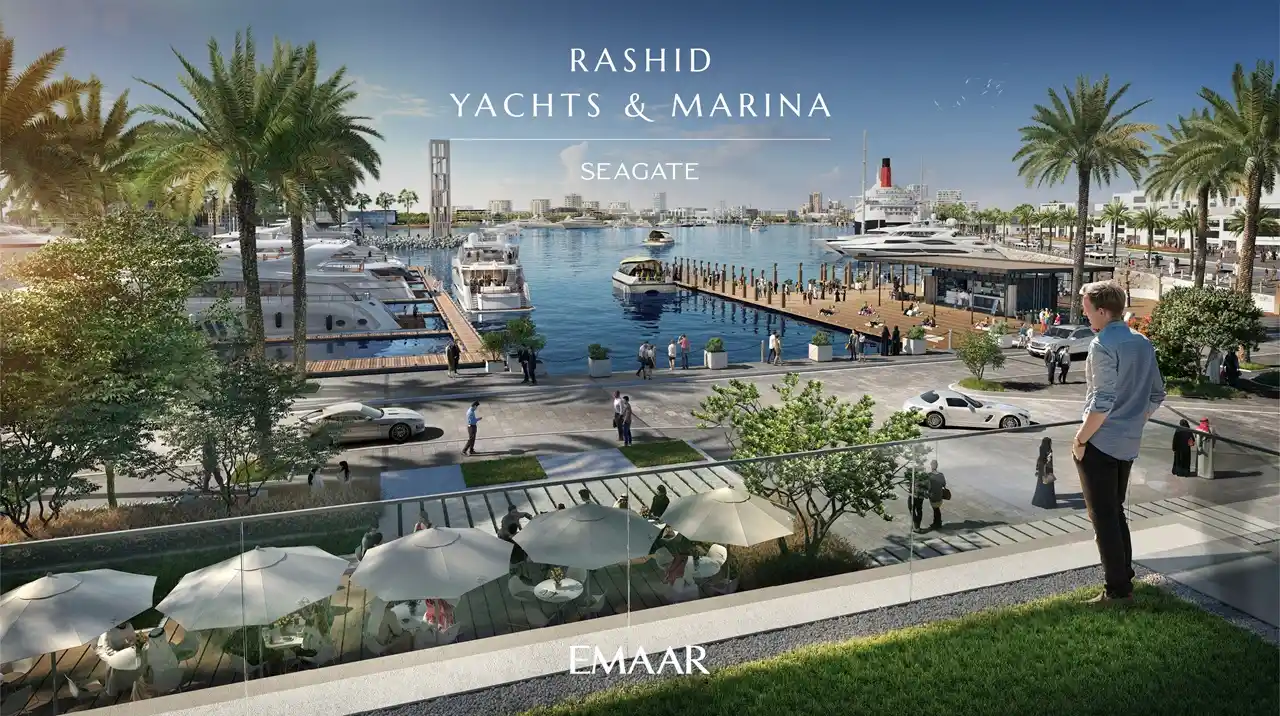 Seagate at Rashid Yachts & Marina by Emaar elevated view of marina promenade with yachts palm trees and waterfront lifestyle in Dubai - Presented by Tohid Fetrat