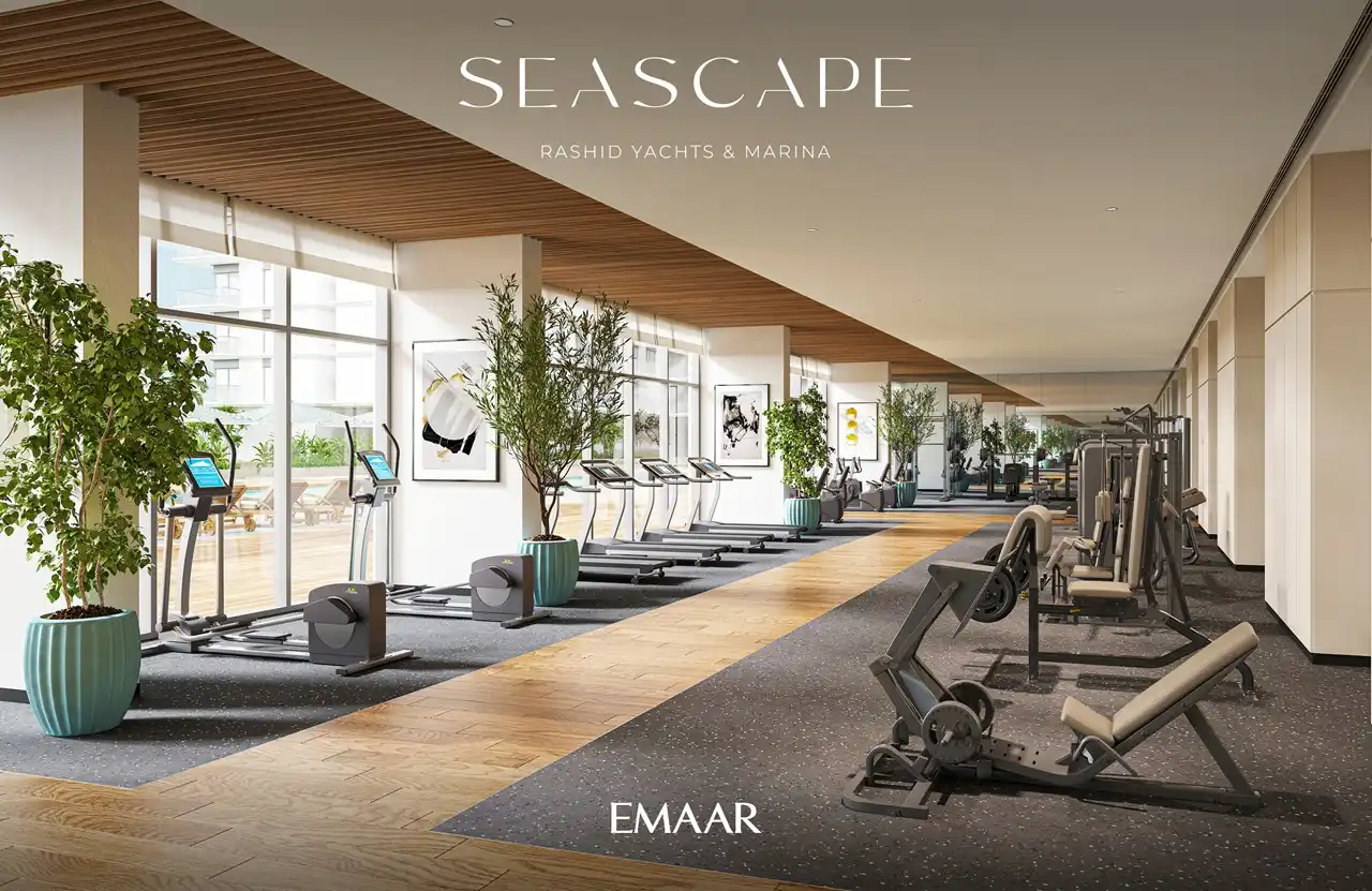 Seascape at Rashid Yachts & Marina by Emaar modern gym with fitness machines cardio equipment and large windows in Dubai - Presented by Tohid Fetrat