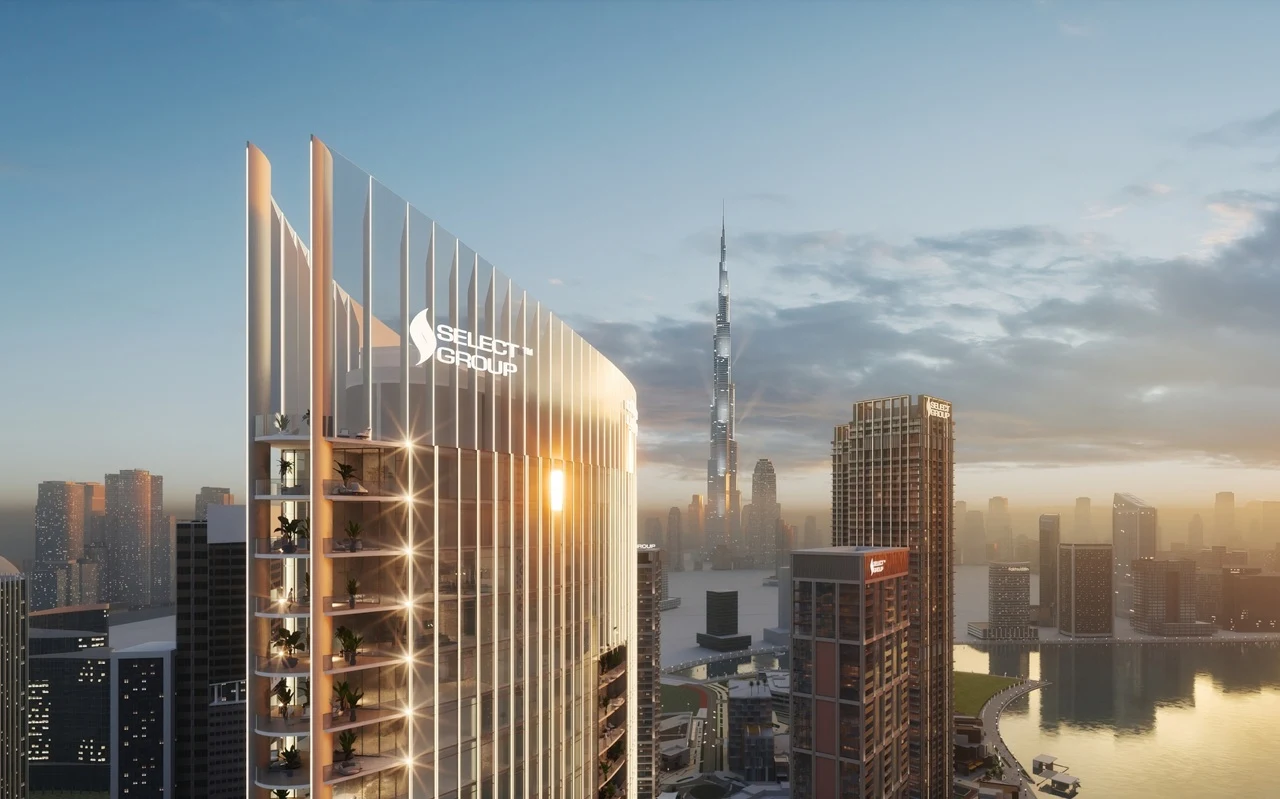 Select Group branded tower with Dubai skyline and Burj Khalifa view during sunset Presented by Tohid Fetrat