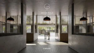Selvara at Grand Polo Club & Resort by Emaar horse stable interior with modern concrete architecture, natural light, and elegant equestrian setting in Dubai Presented by Tohid Fetrat