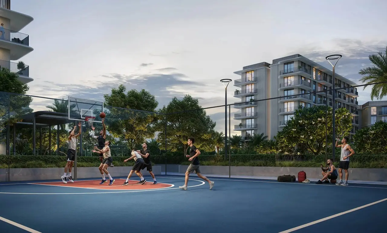 Sera 1 at Rashid Yachts & Marina by Emaar outdoor basketball court with players landscaped surroundings and residential buildings in Dubai - Presented by Tohid Fetrat