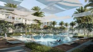 Sera 1 at Rashid Yachts & Marina by Emaar lagoon style pool with sun loungers palm trees and shaded canopy leisure area in Dubai - Presented by Tohid Fetrat