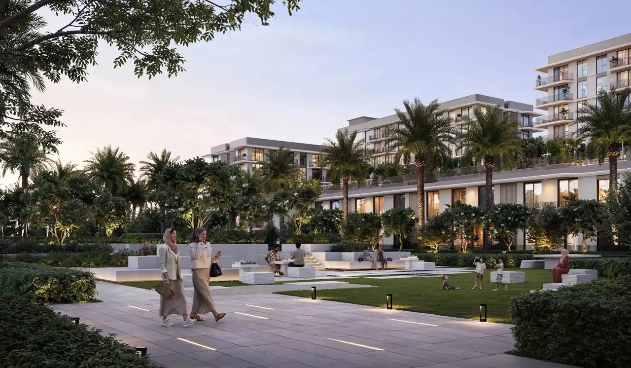 Sera 1 at Rashid Yachts & Marina by Emaar landscaped courtyard garden with palm trees seating areas and residential buildings in Dubai - Presented by Tohid Fetrat