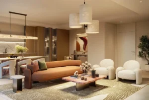 Sera 1 at Rashid Yachts & Marina by Emaar living room with open kitchen modern furniture warm lighting and elegant interior design in Dubai - Presented by Tohid Fetrat