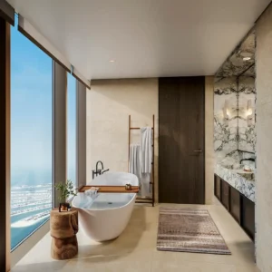 Six Senses Residences Dubai Marina by Select Group luxury bathroom with freestanding bathtub and floor to ceiling windows overlooking Palm Jumeirah views in Dubai - Presented by Tohid Fetrat