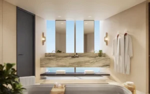 Six Senses Residences Dubai Marina by Select Group luxury bathroom vanity with marble countertop, dual sinks and mirror panels in Dubai - Presented by Tohid Fetrat