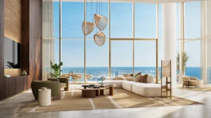 Six Senses Residences Dubai Marina by Select Group elegant living room with floor to ceiling windows and panoramic sea views in Dubai - Presented by Tohid Fetrat