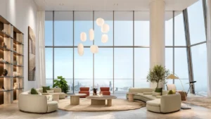 Six Senses Residences Dubai Marina by Select Group luxury living room with double height windows, panoramic city views, and elegant modern interiors in Dubai - Presented by Tohid Fetrat