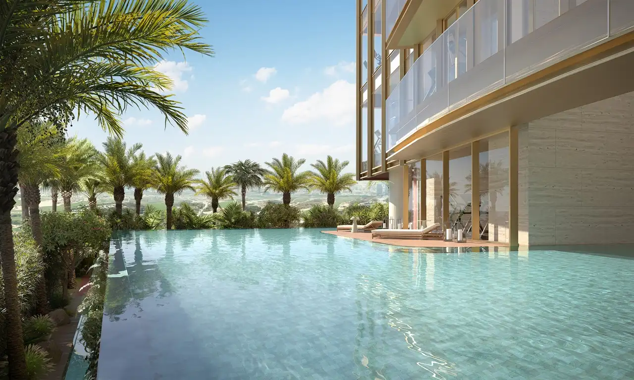 Six Senses Residences Dubai Marina by Select Group pool deck with infinity pool palm trees and lounge seating in Dubai - Presented by Tohid Fetrat