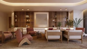 Six Senses Residences Dubai Marina by Select Group residential lounge with warm wood finishes seating areas and curated shelving in Dubai - Presented by Tohid Fetrat
