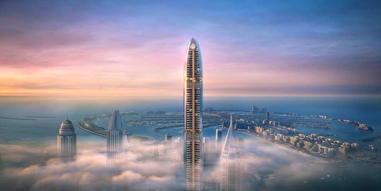 Six Senses Residences Dubai Marina by Select Group aerial tower view above clouds with Palm Jumeirah and Gulf at sunrise in Dubai - Presented by Tohid Fetrat