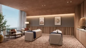 Six Senses Residences Dubai Marina by Select Group spa treatment room with dual massage beds, warm lighting, and serene wellness design in Dubai - Presented by Tohid Fetrat
