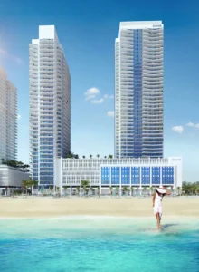 South Beach at Emaar Beachfront by Emaar beachfront towers with sandy shoreline and clear water in Dubai - Presented by Tohid Fetrat