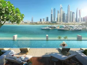 South Beach at Emaar Beachfront by Emaar infinity pool overlooking marina yachts and skyline during daytime in Dubai - Presented by Tohid Fetrat