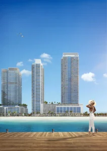 South Beach at Emaar Beachfront by Emaar waterfront deck with beachfront towers and clear blue water in Dubai - Presented by Tohid Fetrat