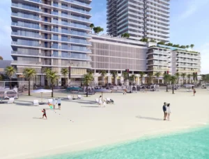 Sunrise Bay at Emaar Beachfront by Emaar beachfront leisure area with sun loungers palm trees and residential towers along the Gulf in Dubai - Presented by Tohid Fetrat