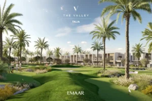 TALIA at The Valley by Emaar landscaped golf style green park with palm trees and modern townhouses in Dubai - Presented by Tohid Fetrat