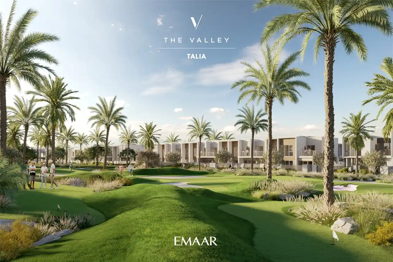 TALIA at The Valley by Emaar landscaped golf style green park with palm trees and modern townhouses in Dubai - Presented by Tohid Fetrat