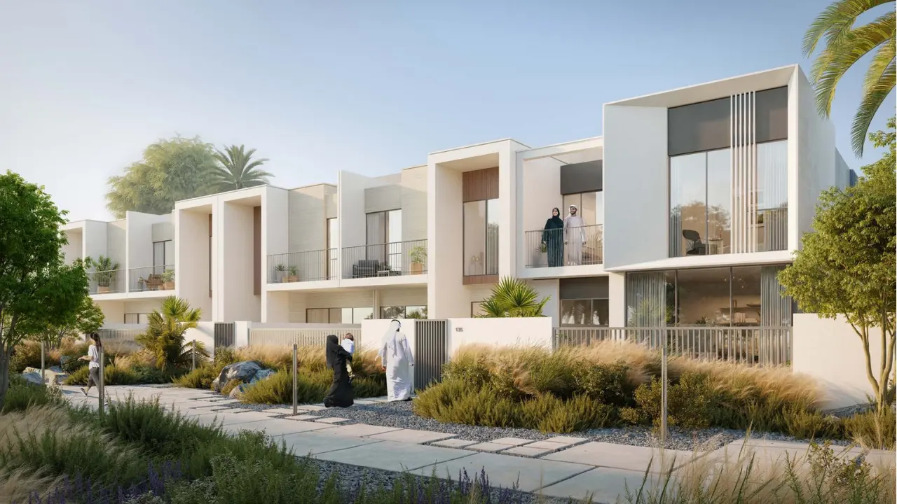 TALIA at The Valley by Emaar modern townhouse facades with landscaped garden pathway greenery and pedestrian walkway in Dubai - Presented by Tohid Fetrat