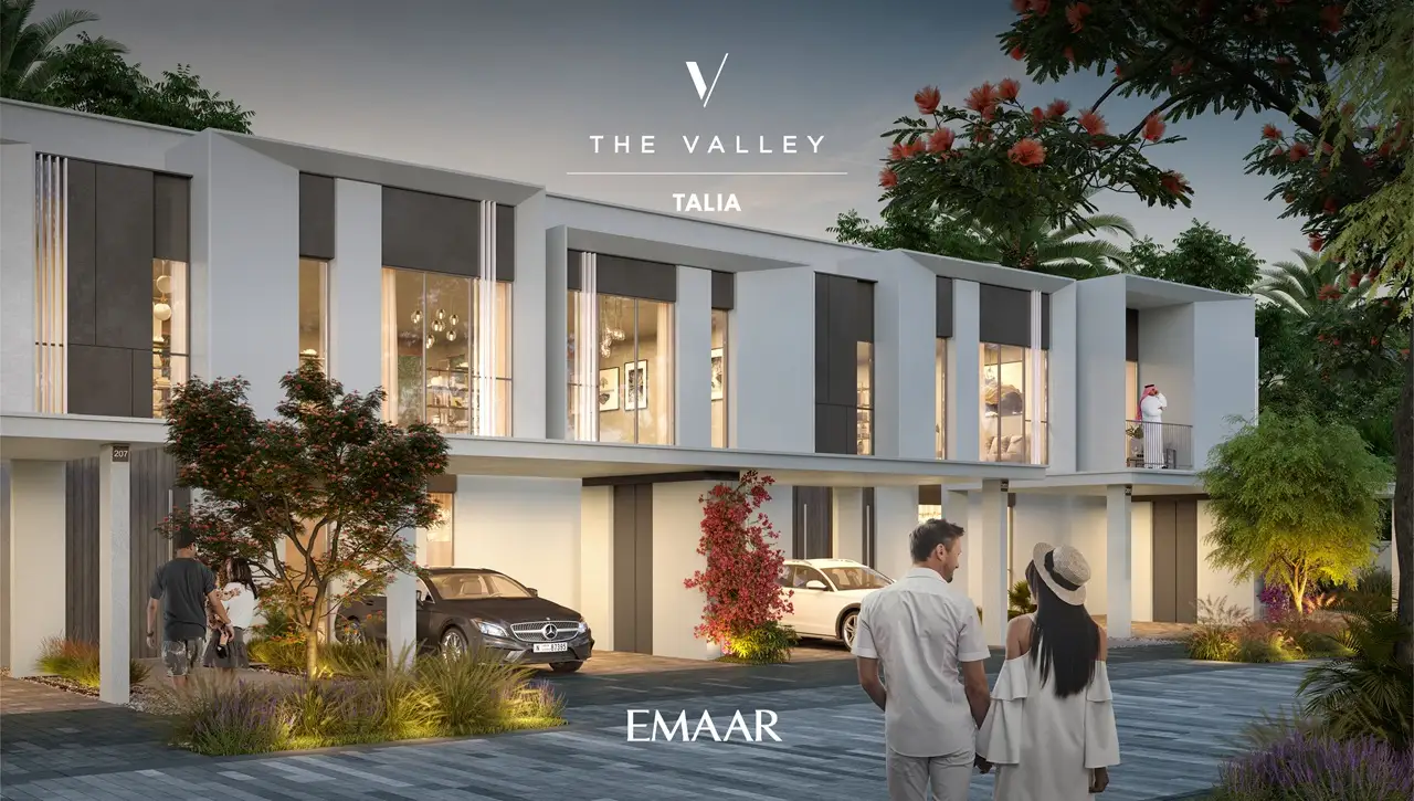 TALIA at The Valley by Emaar modern townhouse facade with landscaped driveway private parking and elegant exterior lighting in Dubai - Presented by Tohid Fetrat