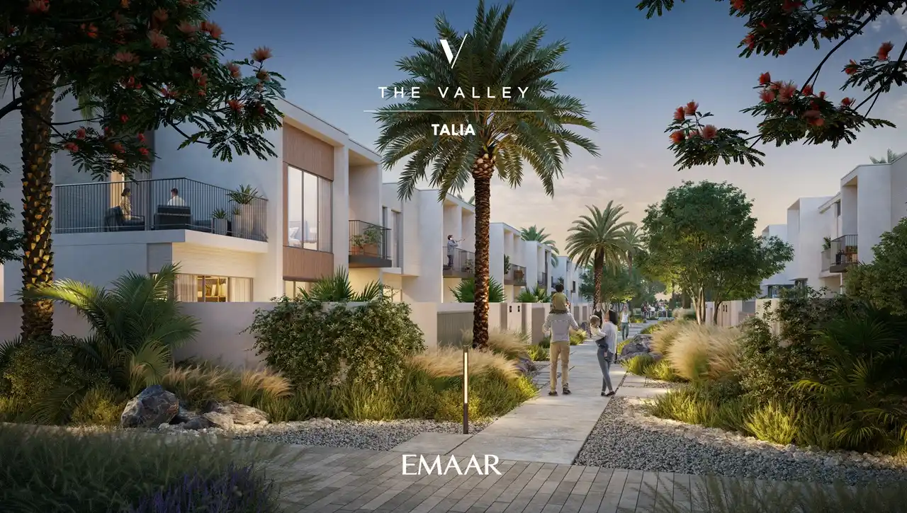 TALIA at The Valley by Emaar pedestrian pathway with landscaped gardens palm trees and modern townhouses in Dubai - Presented by Tohid Fetrat